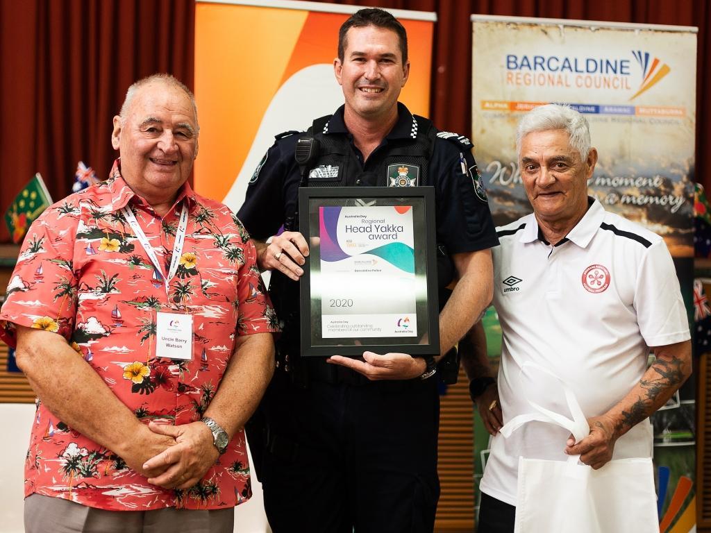 Barcaldine HEad Yakka Award won by Barcaldine Police L-R Uncle Barry Watson, Sgt Matthew Hows and Jay Larkins